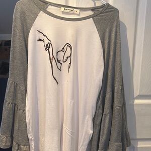 Three Birds Nest baseball shirt with the dog and we’ve got this hand to paw